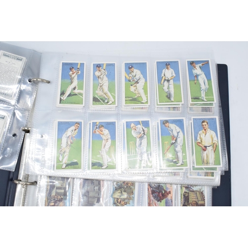 215J - A quantity of cigarette cards to consist of various themes to incluide cricket, sport, war time etc ... 