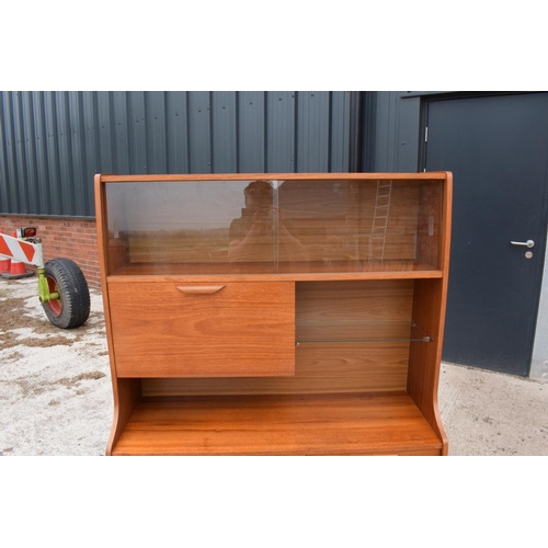 393 - A good mid century teak or similar wood cabinet / sideboard with glass sliding doors and drawers etc... 