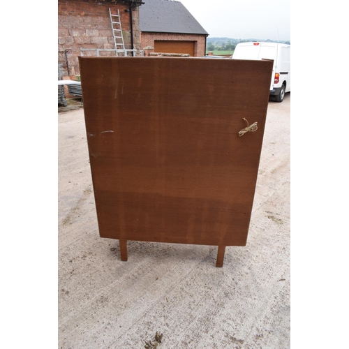 393 - A good mid century teak or similar wood cabinet / sideboard with glass sliding doors and drawers etc... 