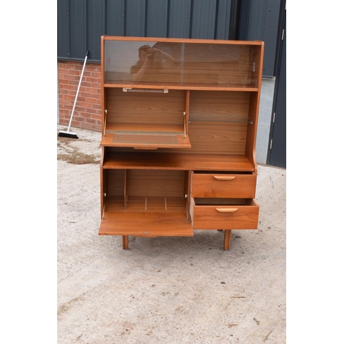 393 - A good mid century teak or similar wood cabinet / sideboard with glass sliding doors and drawers etc... 