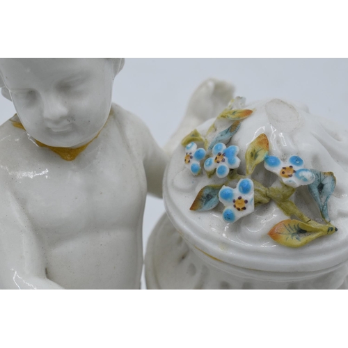 95D - A pair of Meissen Continental figures depicting cherubs with floral urns with 'JR' monogram to base ... 