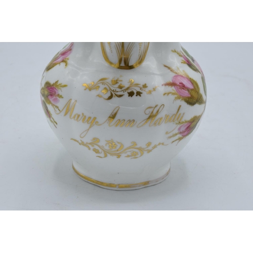 95F - A late 19th century Staffordshire painted jug with 'Mary Ann Hardy' to front. 14cm tall. In good con... 