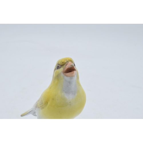 95I - An early 20th century Meissen figure of a yellow canary with crossed swords mark and '227' inprinted... 