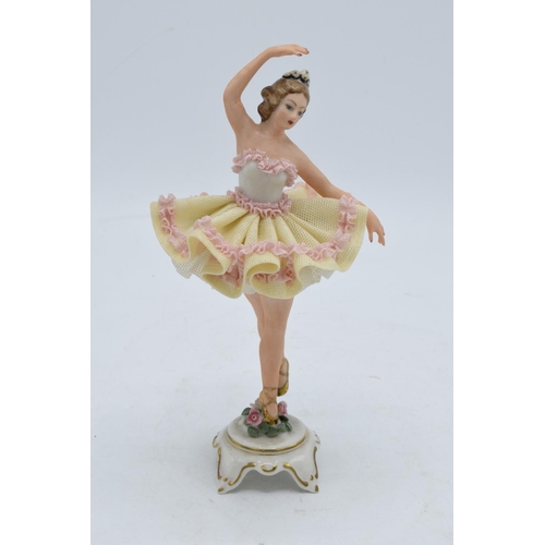 95J - A late 19th/ early 20th century Dresden lace figure of a ballerina with the 'N' mark below a 5-prong... 