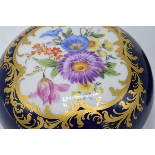 95O - A collection of early 20th century Meissen porcelain to include a circular trinket box with floral s... 