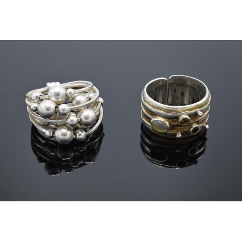 215K - Two designer silver rings: One with multiple mobile silver balls, maker Kch, .925 London import mark... 