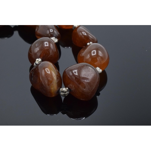 215M - Large & heavy string of semi precious gemstone agate (or similar ) beads.