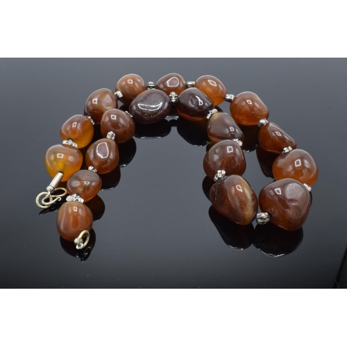 215M - Large & heavy string of semi precious gemstone agate (or similar ) beads.