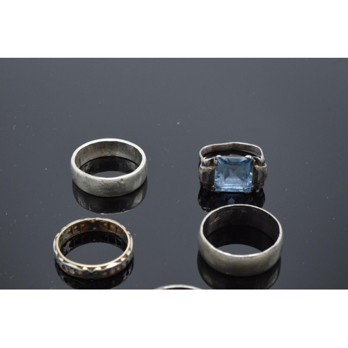 215N - Seven assorted silver rings, some gem or paste set, two mishapen (7)