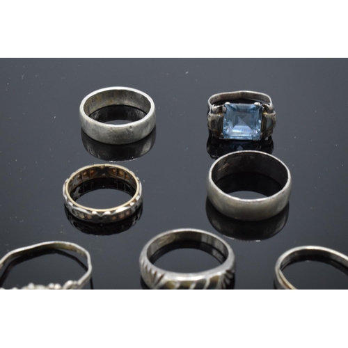 215N - Seven assorted silver rings, some gem or paste set, two mishapen (7)