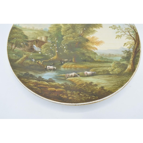 75A - Victorian Staffordshire hand painted wall plaque, titled to reverse ‘ A pastoral Landscape’, and ind... 