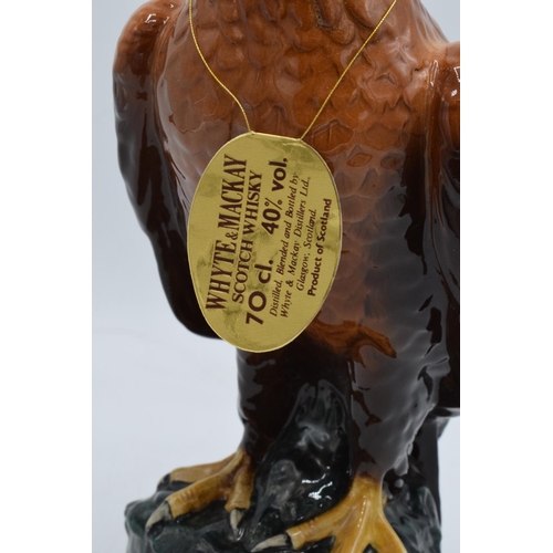 56 - Royal Doulton golden eagle Whyte and Mackay Scotch Whiskey 70cl 40% with contents. In good condition... 