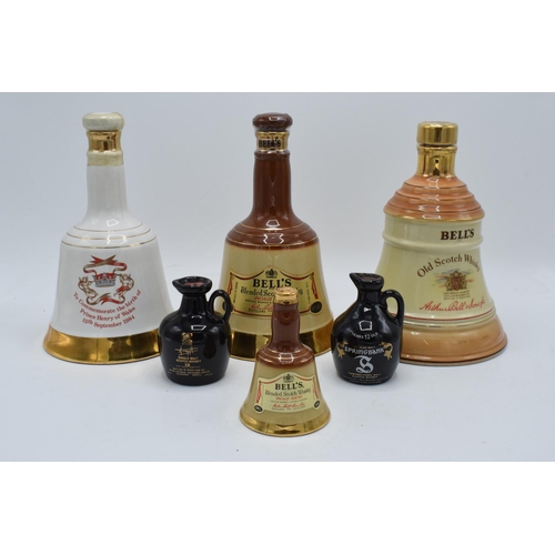 61 - A collection of sealed whisky decanters to include Bells Old Scotch 75cl 43%, Birth of Prince Henry ... 