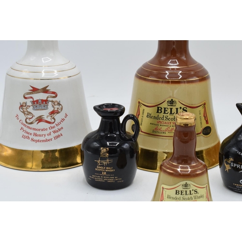 61 - A collection of sealed whisky decanters to include Bells Old Scotch 75cl 43%, Birth of Prince Henry ... 