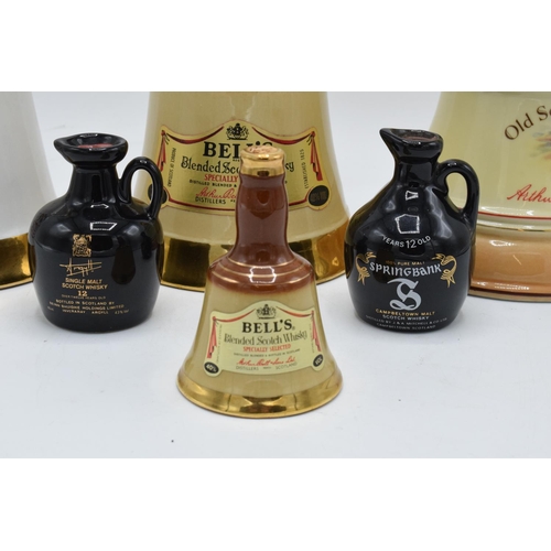 61 - A collection of sealed whisky decanters to include Bells Old Scotch 75cl 43%, Birth of Prince Henry ... 