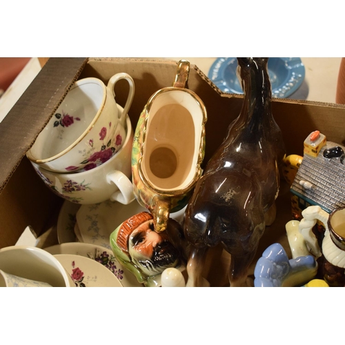 19 - A mixed collection of pottery to include a Melba ware horse, Hose Street pottery, novelty teapots et... 