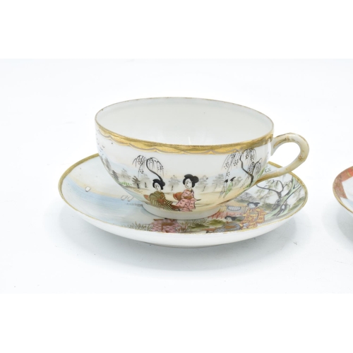 21 - A pair of Japanese export ware tea cups and saucers (2 duos).