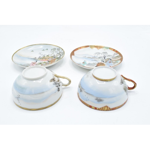 21 - A pair of Japanese export ware tea cups and saucers (2 duos).