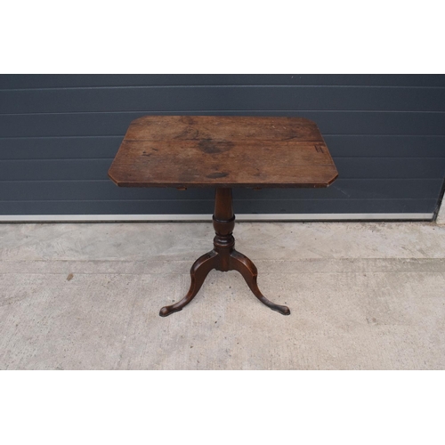 112 - A 19th century oak tripod table. 72cm tall. In good functional condition though as expected are show... 