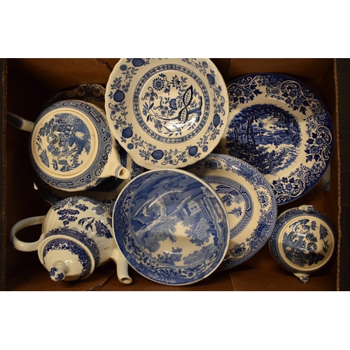 29 - A large collection of 19th and 20th century blue and white pottery to include tea pots, duos, plates... 