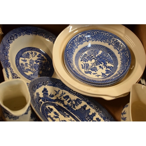 29 - A large collection of 19th and 20th century blue and white pottery to include tea pots, duos, plates... 