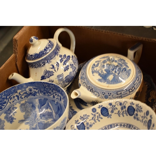 29 - A large collection of 19th and 20th century blue and white pottery to include tea pots, duos, plates... 