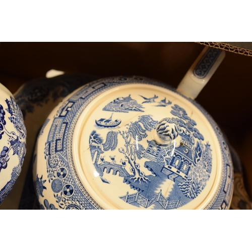 29 - A large collection of 19th and 20th century blue and white pottery to include tea pots, duos, plates... 