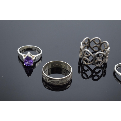 303 - A collection of silver 925 rings to consist of various sizes and designs, some are set with semi-pre... 