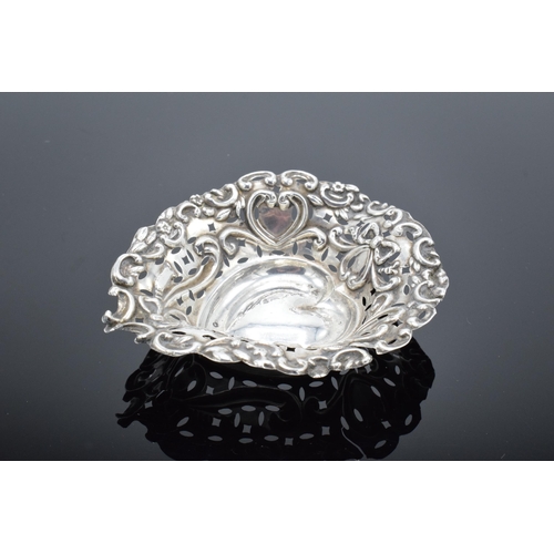 310 - An ornate silver sweet dish/ small tray Birmingham 1900. 9cm by 7cm. 11.9 grams.