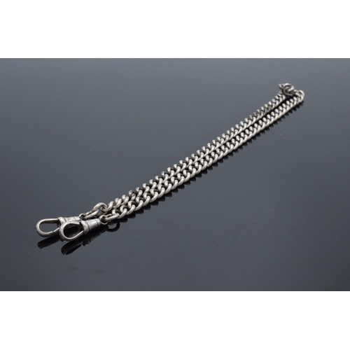 325 - A silver Albert watch chain with English lion hallmark on every link. 36.3 grams. 42cm long. In good... 