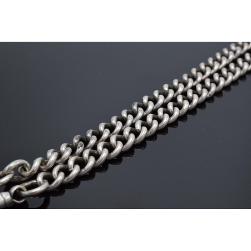 325 - A silver Albert watch chain with English lion hallmark on every link. 36.3 grams. 42cm long. In good... 