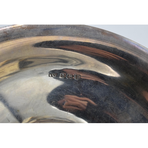 334 - A loaded silver comport hallmarked for Birmingham 1920 or 1945. 14cm diameter. In good condition wit... 