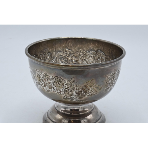 336 - A silver footed bowl with floral decoration. Hallmarked for Birmingham 1972. 178.4 grams. 12.5cm dia... 