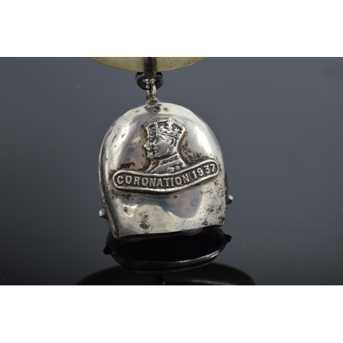 362 - A silver babies bell with teething ring hallmarked for Birmingham 1936 for the Coronation of 1937.