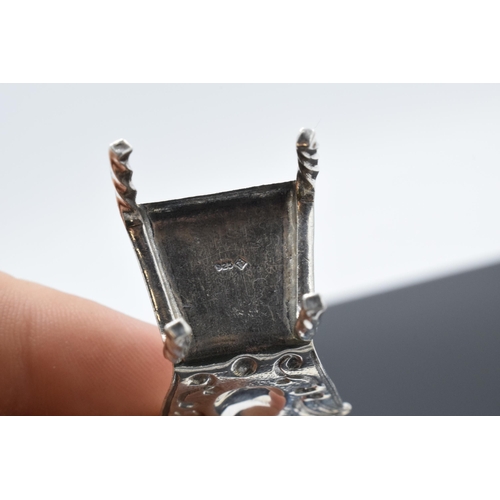 363 - Silver (925) miniature model of a hall chair. 10.8 grams. 5cm tall.