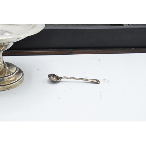 372 - A collection of hallmarked silver items to include a loaded small comport (af), a silver spoon toget... 