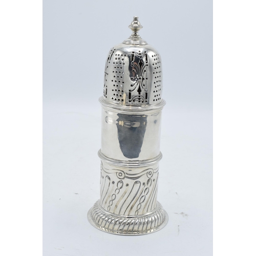 377 - Large ornate silver sugar sifter / caster. 258.5 grams.  Hallmarks on body rubbed. 19.5cm tall. In g... 