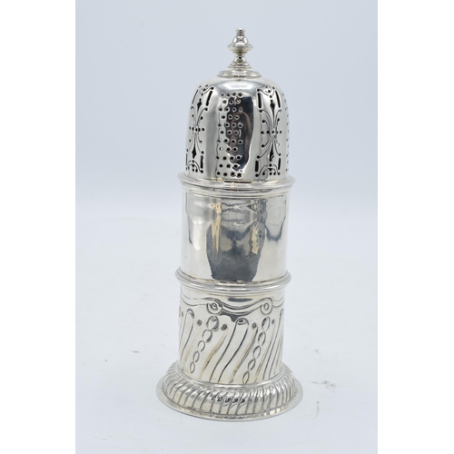 377 - Large ornate silver sugar sifter / caster. 258.5 grams.  Hallmarks on body rubbed. 19.5cm tall. In g... 