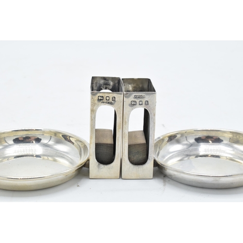 389 - A pair of Asprey's silver match box holders and ashtrays. London 1925. 59.7 grams gross weight. 4.5c... 