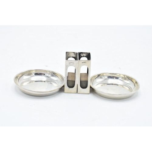 389 - A pair of Asprey's silver match box holders and ashtrays. London 1925. 59.7 grams gross weight. 4.5c... 