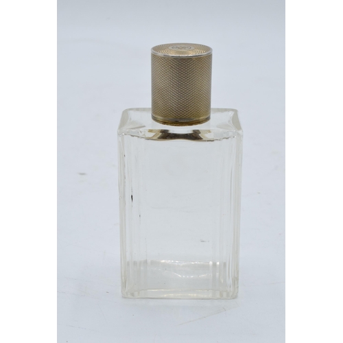 395 - A silver topped French glass scent bottle. 9cm tall.