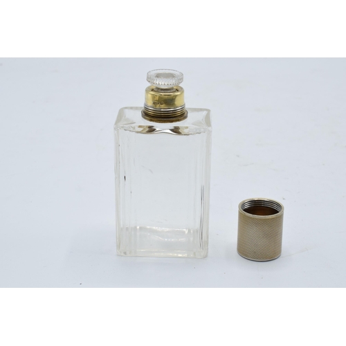 395 - A silver topped French glass scent bottle. 9cm tall.