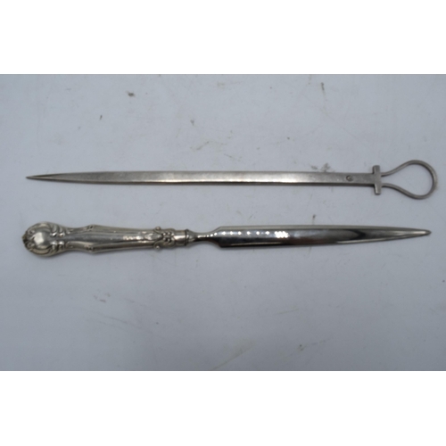 400 - A silver handled letter opener together with a silver plated meat skewer (2).