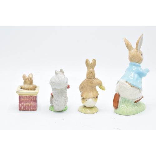 145 - A collection of Beatrix Potter figures to include Beswick large Peter Rabbit, Timmy Tiptoes and Tom ... 