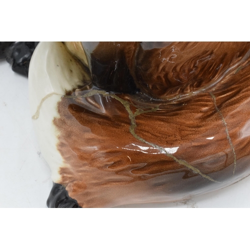 146 - Beswick Fireside Fox 2348. The top half and body of the piece is in good condition however the base ... 