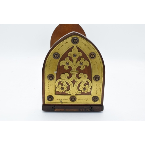 153 - An early 20th century wooden and brass adjustable bookshelf. 54cm at longest. In good condition.