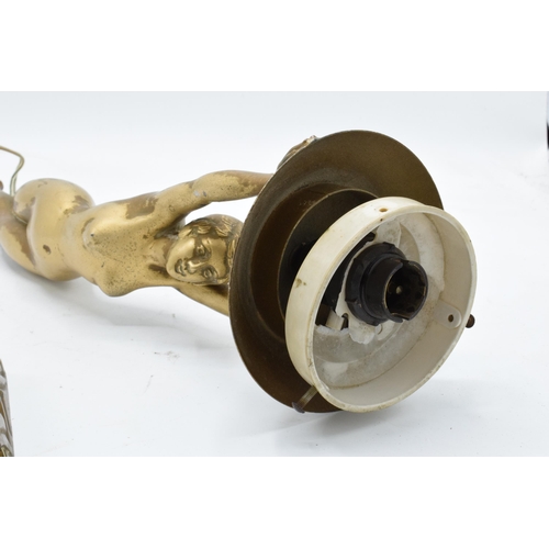 154A - An Art-Deco nude figural lamp base with the lady supporting the light shade with impressed 'Limousin... 