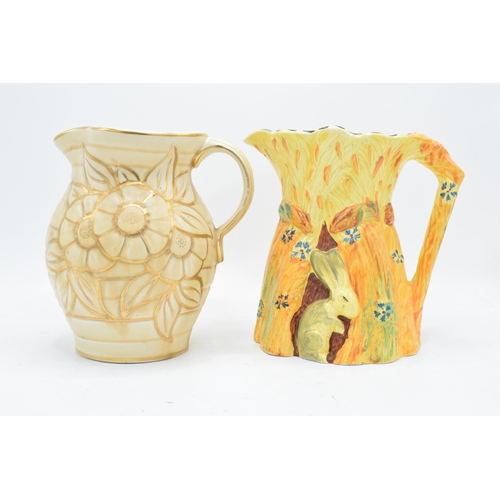 63 - A Burleigh Ware jug 'The Harvest Rabbit' together with a Hancocks Ivory Ware jug (2). 19cm tallest. ... 