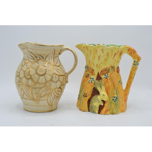 63 - A Burleigh Ware jug 'The Harvest Rabbit' together with a Hancocks Ivory Ware jug (2). 19cm tallest. ... 