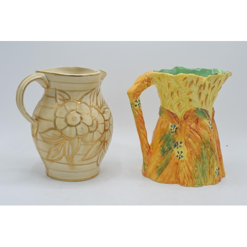 63 - A Burleigh Ware jug 'The Harvest Rabbit' together with a Hancocks Ivory Ware jug (2). 19cm tallest. ... 